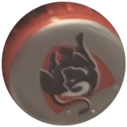 Diable noir sur losange rouge, fond gris