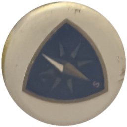 Boussole sur triangle bleu (fond blanc)