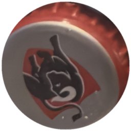 Diable noir sur losange rouge, fond gris